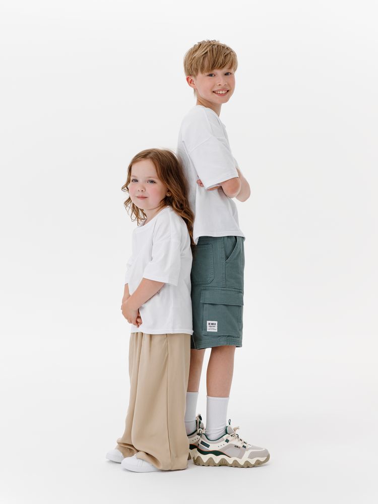 Футболка детская оверсайз Teezer, белая / Миниатюра модельного (1000)