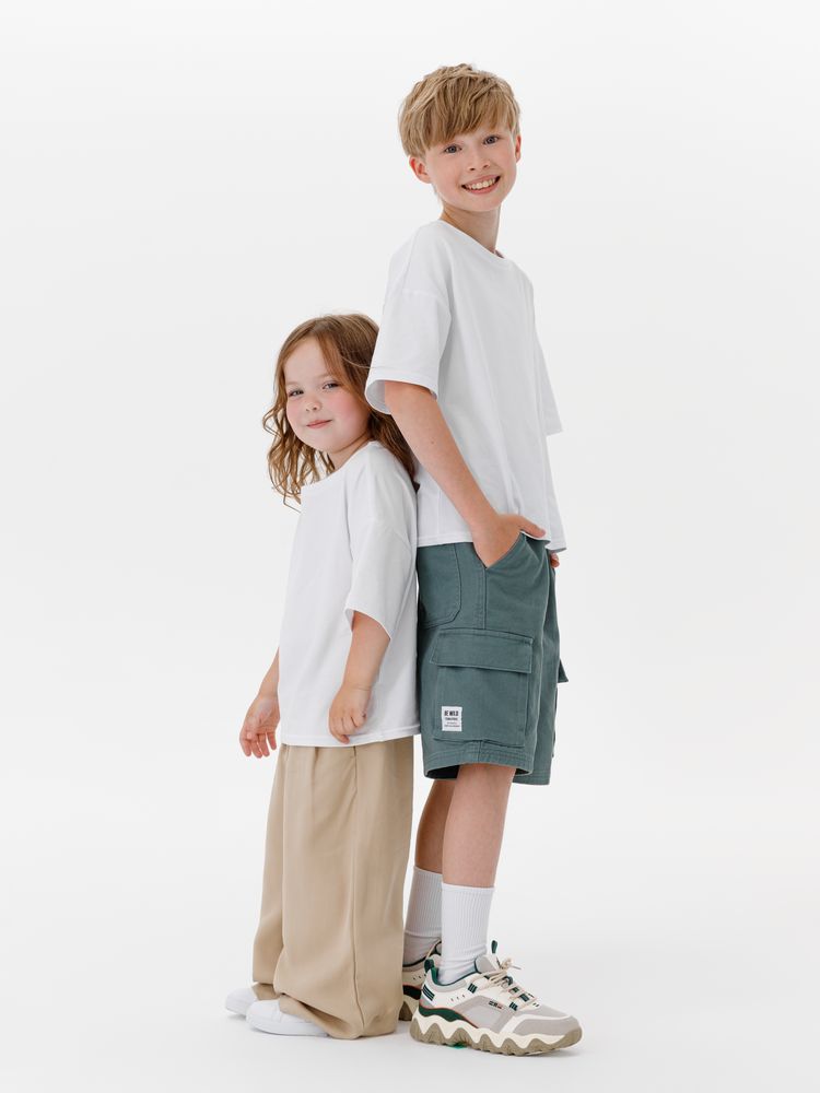 Футболка детская оверсайз Teezer, белая / Миниатюра модельного (1000)